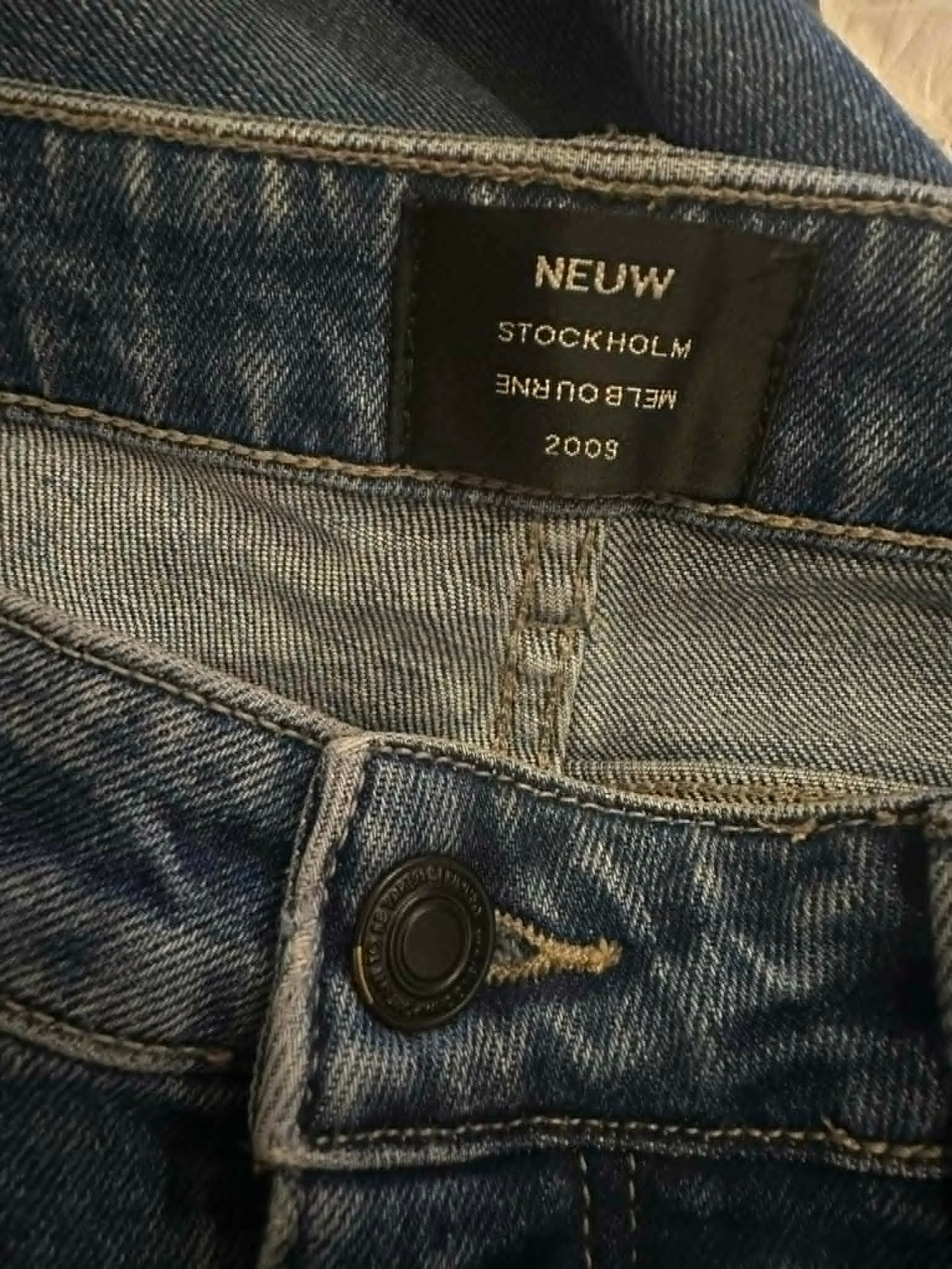 NEUW Denim Iggy Skinny jeans back view on hanger