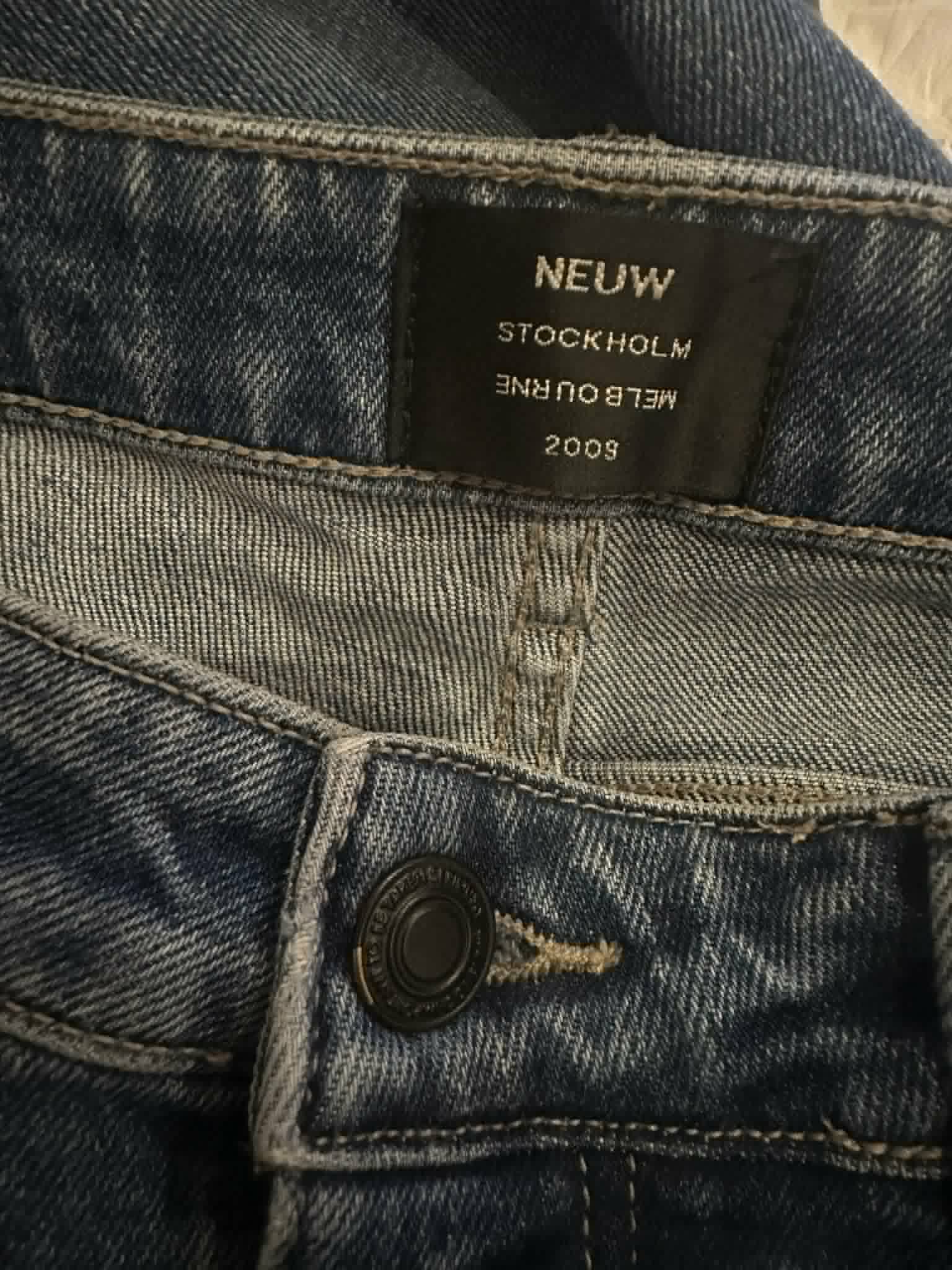 NEUW Denim Iggy Skinny jeans back view on hanger