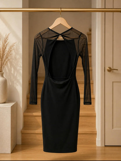 Kookai black mesh-sleeve open-back bodycon dress back view showing open back and cross-strap detail