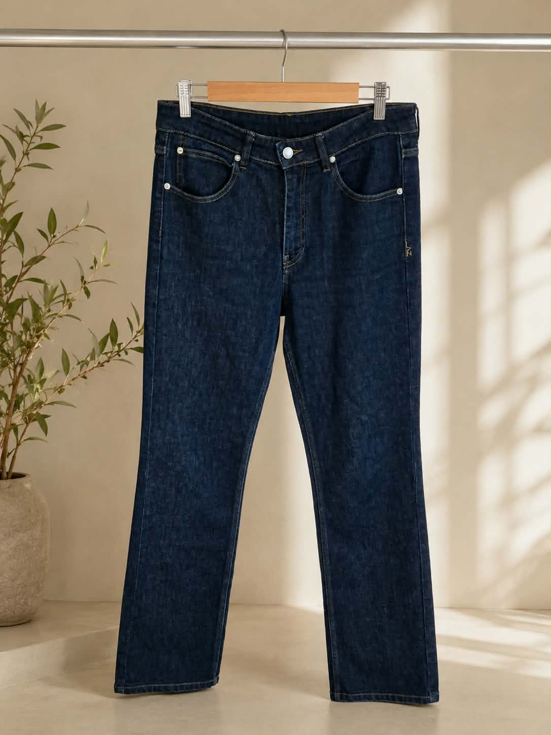 Dark indigo straight-leg jeans, front view