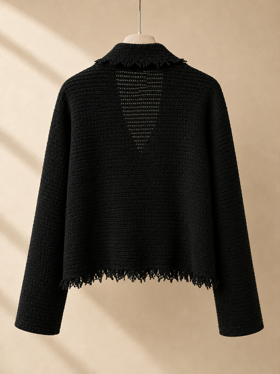 La Bottega di Brunella frayed tweed jacket back view on hanger