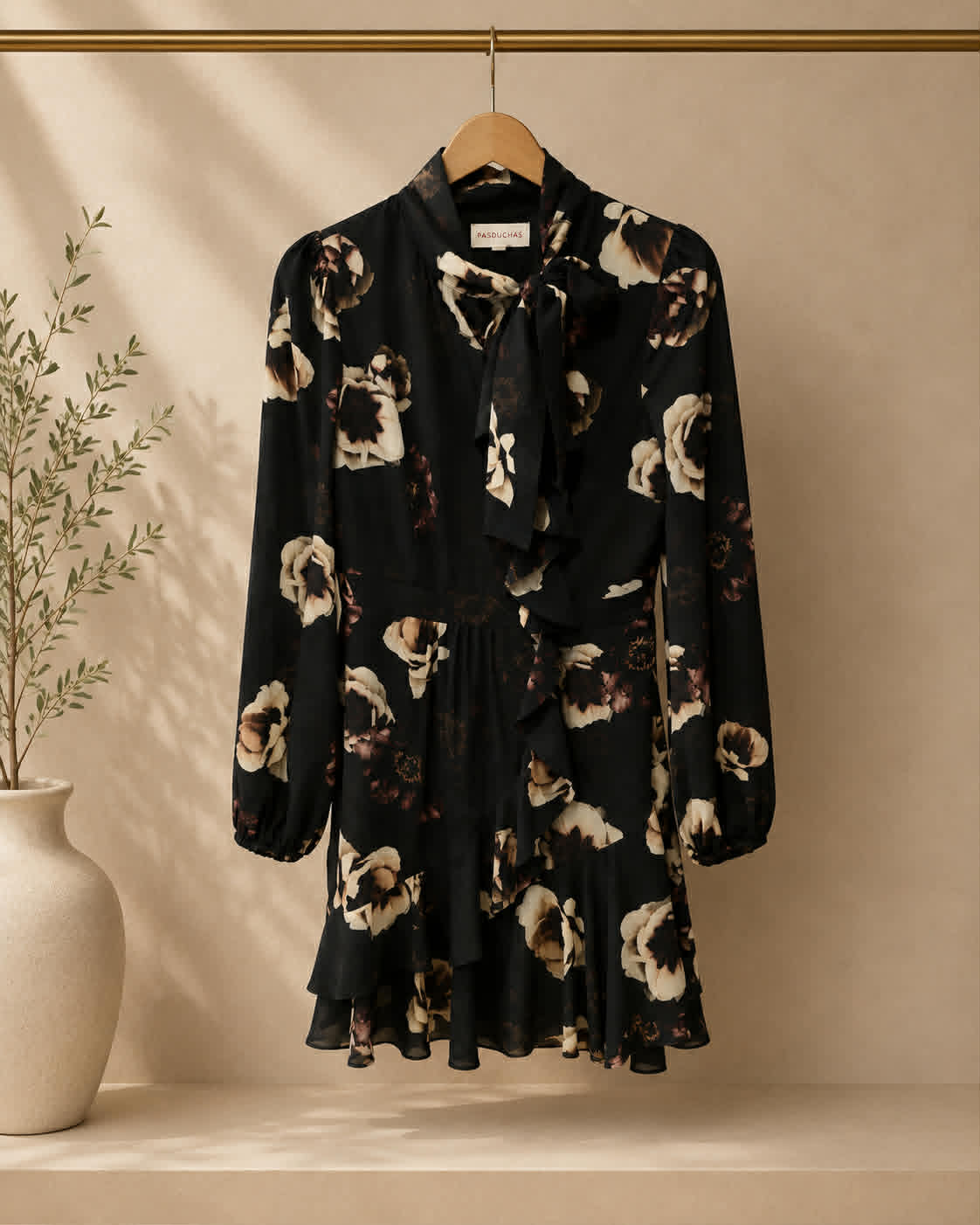 Pasduchas black floral mini dress front on hanger