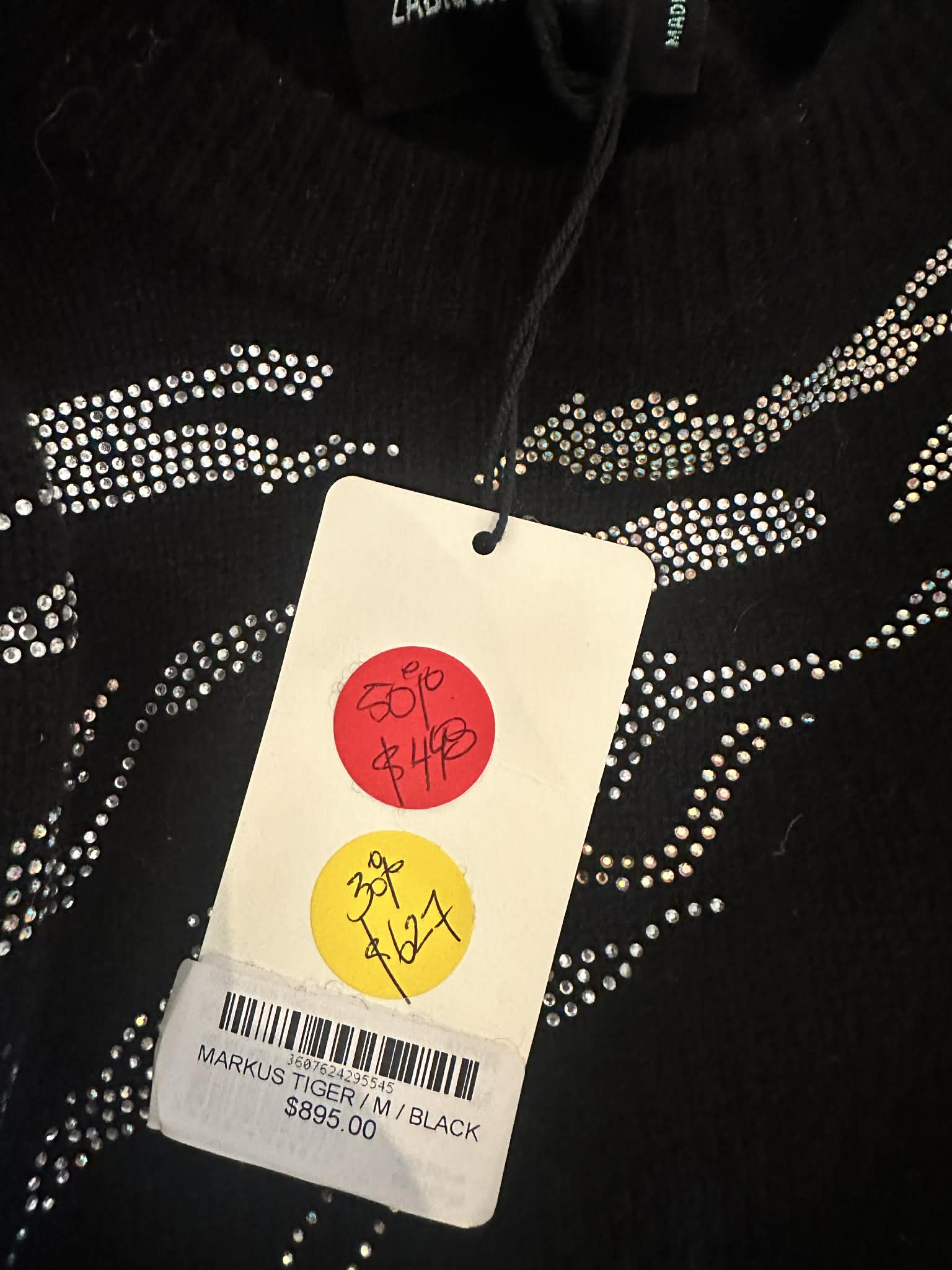 Original retail tag showing Markus Tiger M Black $895