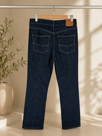 Dark indigo straight-leg jeans, back view